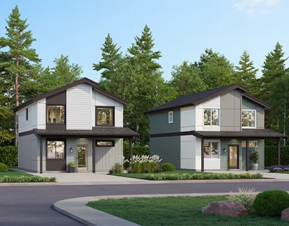 Two modern two-story houses with large windows stand side by side on a quiet suburban street, surrounded by green trees and well-kept lawns under a clear sky.
